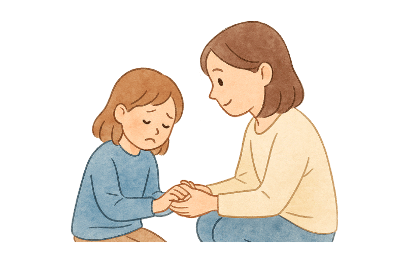 悲しむ子供と寄り添う大人